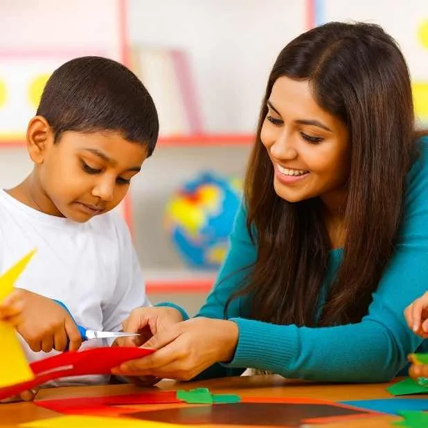 Therapist and child doing a craft