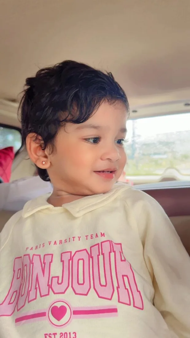 A confident, smiling child at Amyra Institute