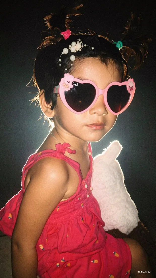 A smiling child dressed up for a fun day