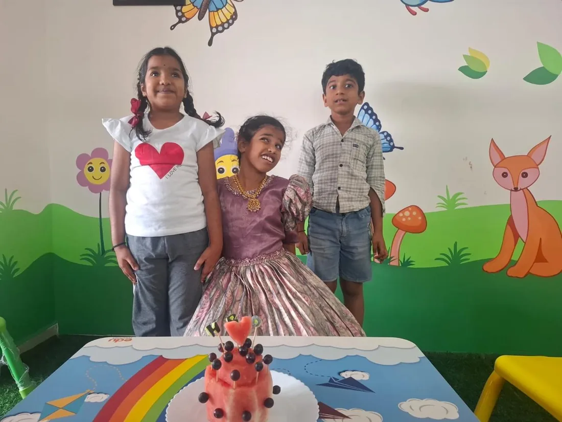 Children's Day celebration with cake and friends