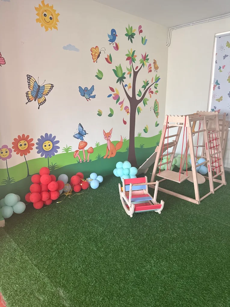 A young child in an early-intervention play session